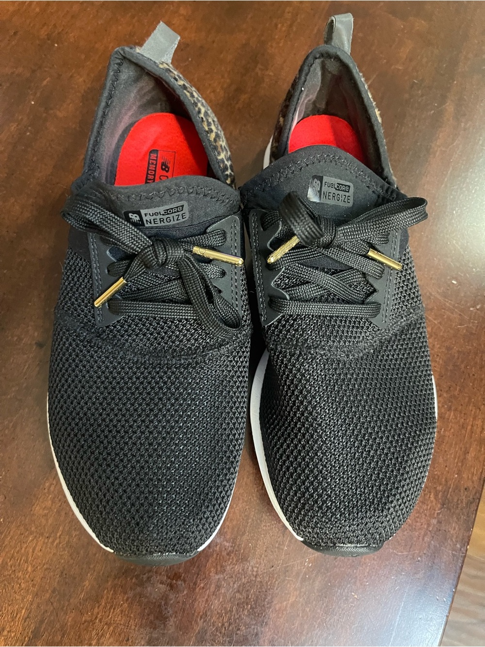 New Balance Women’s Black Knit Lace-Up Sneakers with Gold Accents